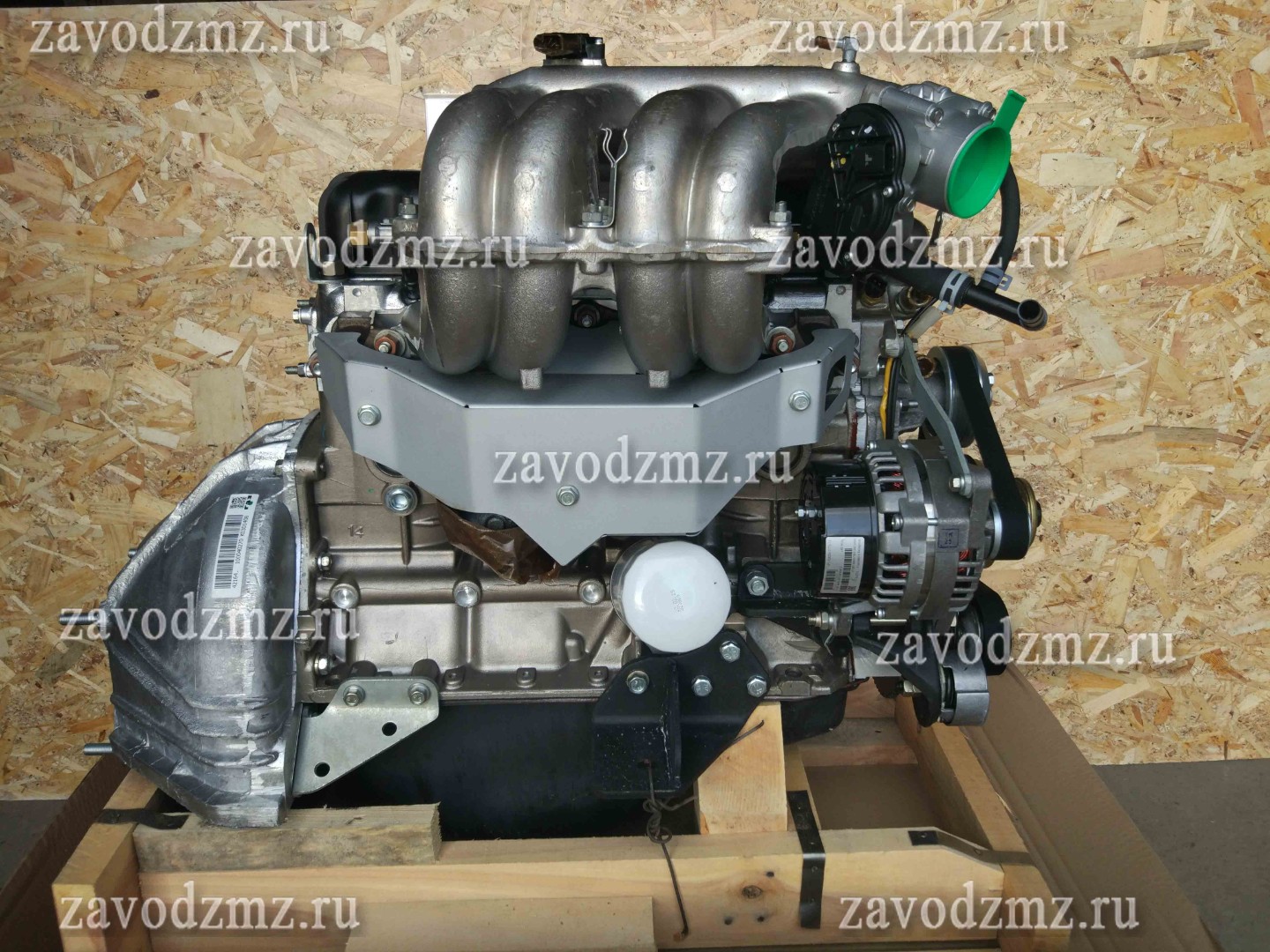 Двигатель умз отзывы. Двигатель УМЗ 4213. УМЗ-42164. Двигатель УМЗ фото с женщиной крышкой.